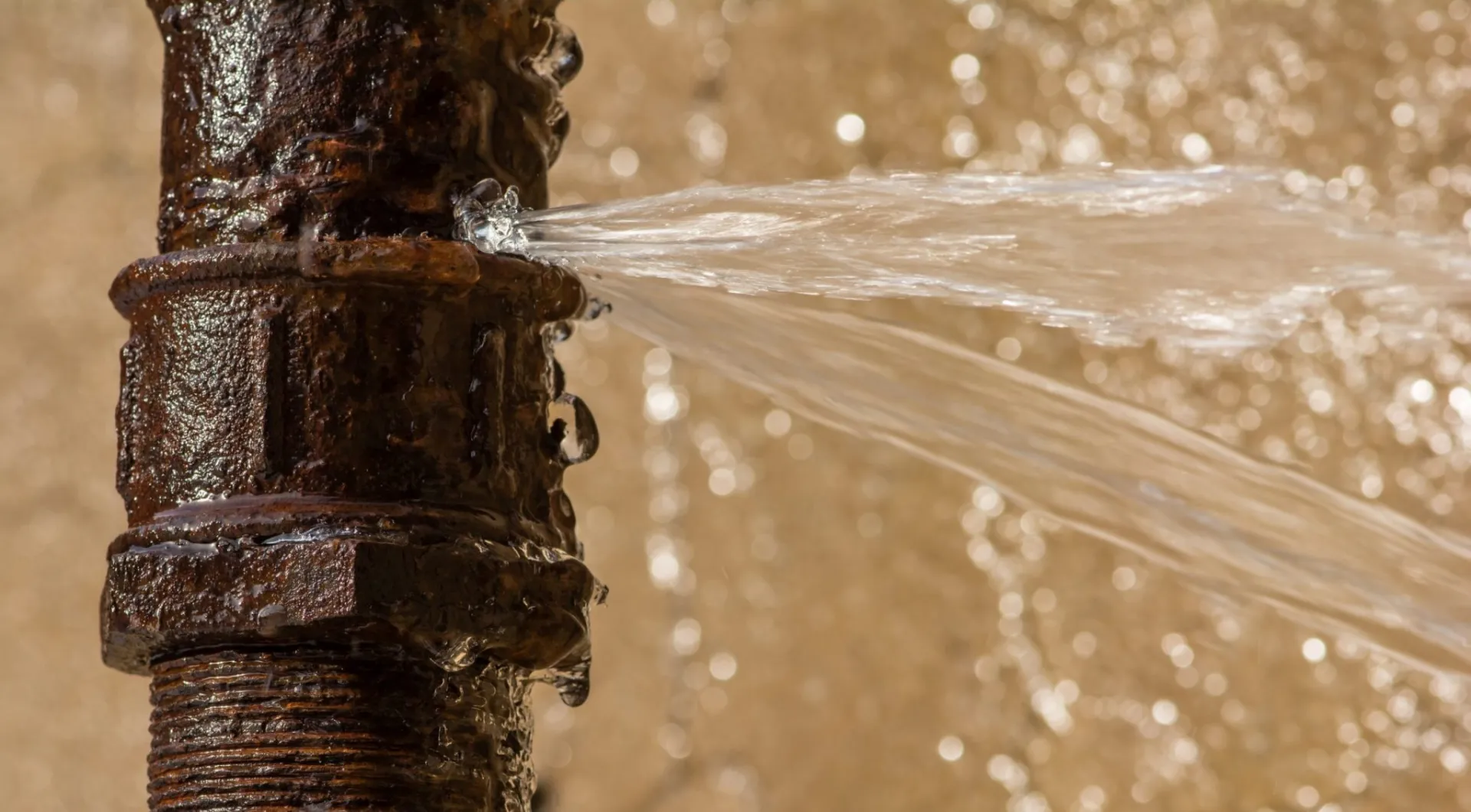 Smart water shutoff device installed on main water line in garage